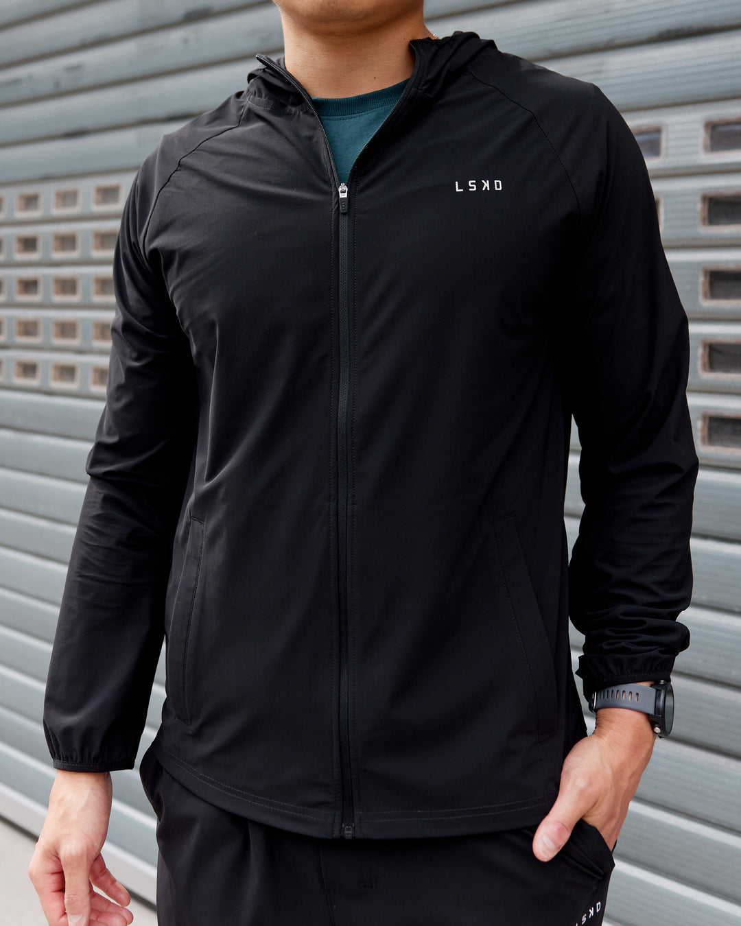 Man wearing Train-Lite FLXMAX Jacket - Black - view 1