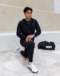 Man wearing Train-Lite FLXMAX Jacket - Black | Thumbnail Index: 3