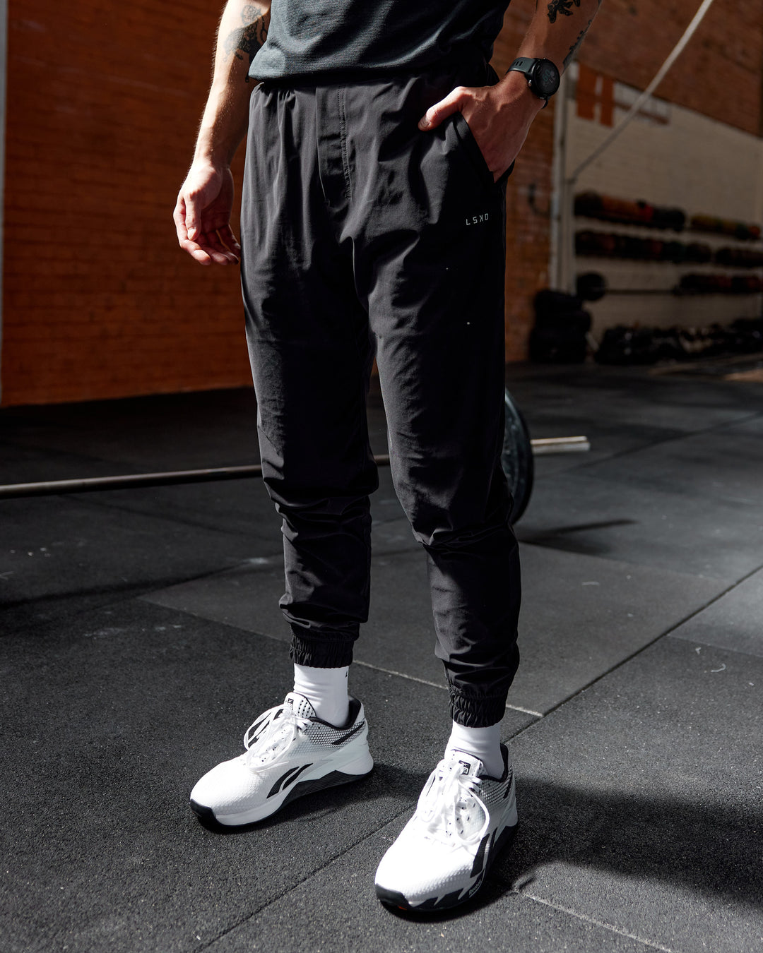 Man wearing Train-Lite FLXMAX Pant - Black - view 1