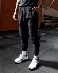 Man wearing Train-Lite FLXMAX Pant - Black | Thumbnail Index: 0