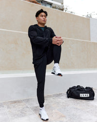 Man wearing Train-Lite FLXMAX Pant - Black | Thumbnail Index: 4