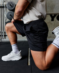 Man Wearing Restore CloudFLX Short - Black | Model:Ollie | Size:L | Thumbnail Index: 3