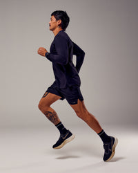 Man wearing Pace 5" Lined Performance Shorts - Black-Retro Blue | Thumbnail Index: 3