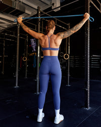Woman wearing Progression Sports Bra - Future Dusk | Thumbnail Index: 0
