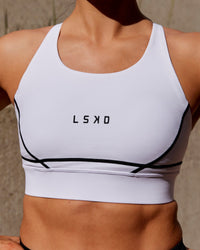 Woman wearing Pulse Sports Bra - White | Thumbnail Index: 5