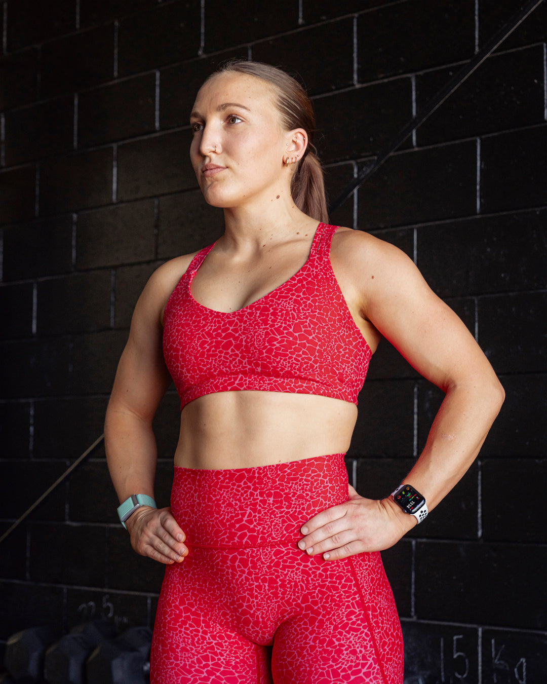 Woman wearing Push The Limit Sports Bra - Red Vitality Print - view 4