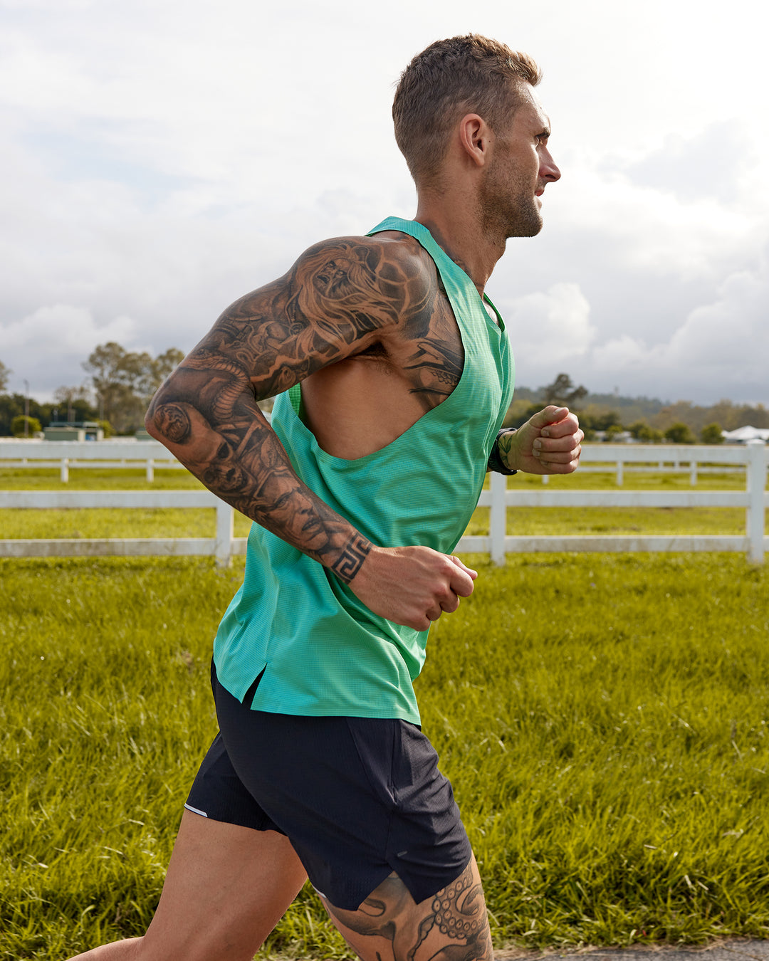 Man wearing Race Day Performance Tank - Mystic Green - view 1