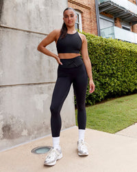 Woman wearing Resistance Ultra High-Rise Full Length Legging - Black | Thumbnail Index: 0