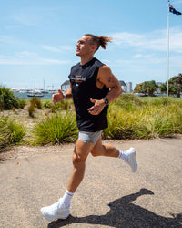 Man wearing Rover FLXCotton Tank - Black-White | Thumbnail Index: 1