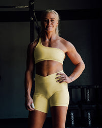 Woman wearing Sara Helios Sports Bra - Sunflower | Thumbnail Index: 4