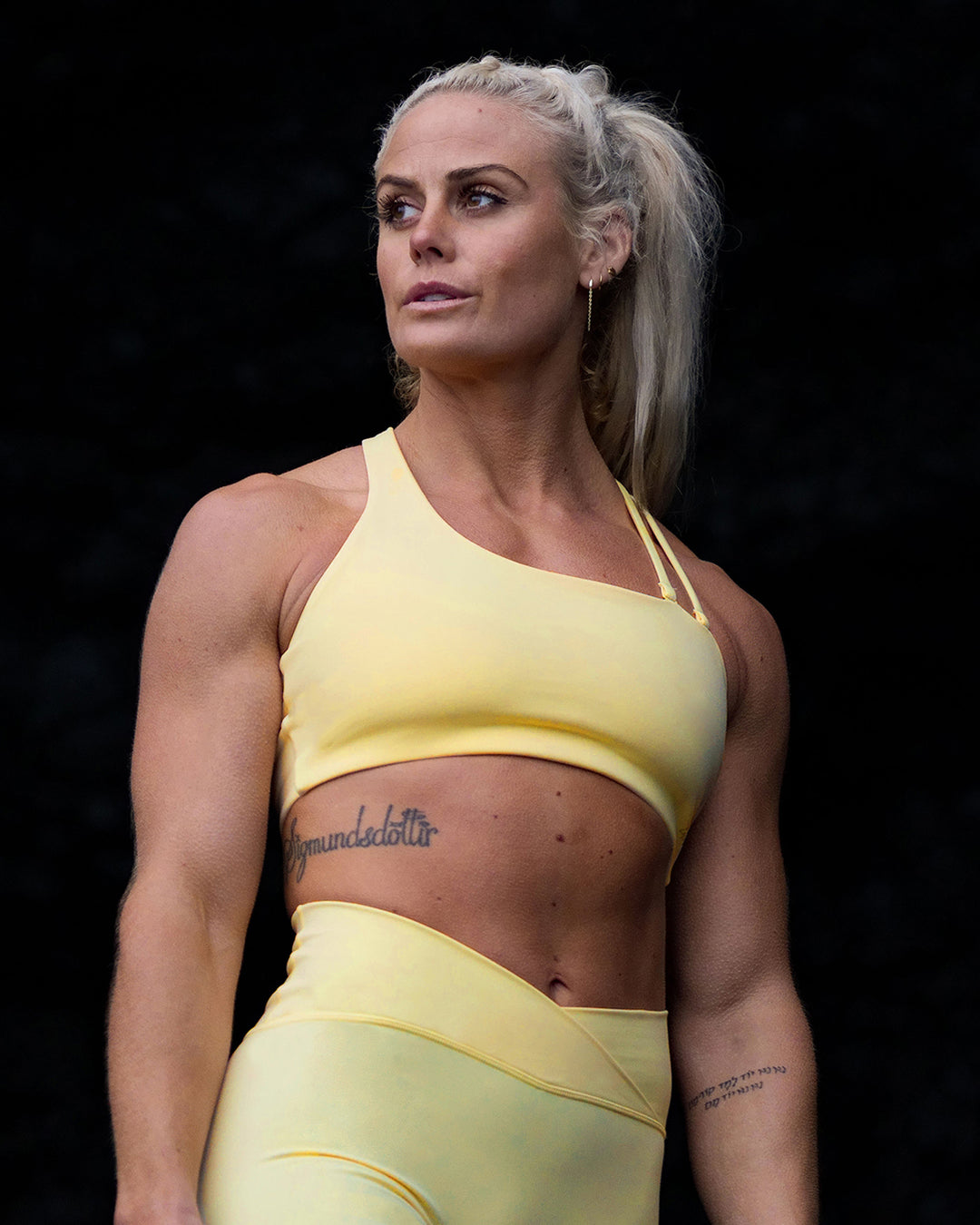 Woman wearing Sara Helios Sports Bra - Sunflower - view 1