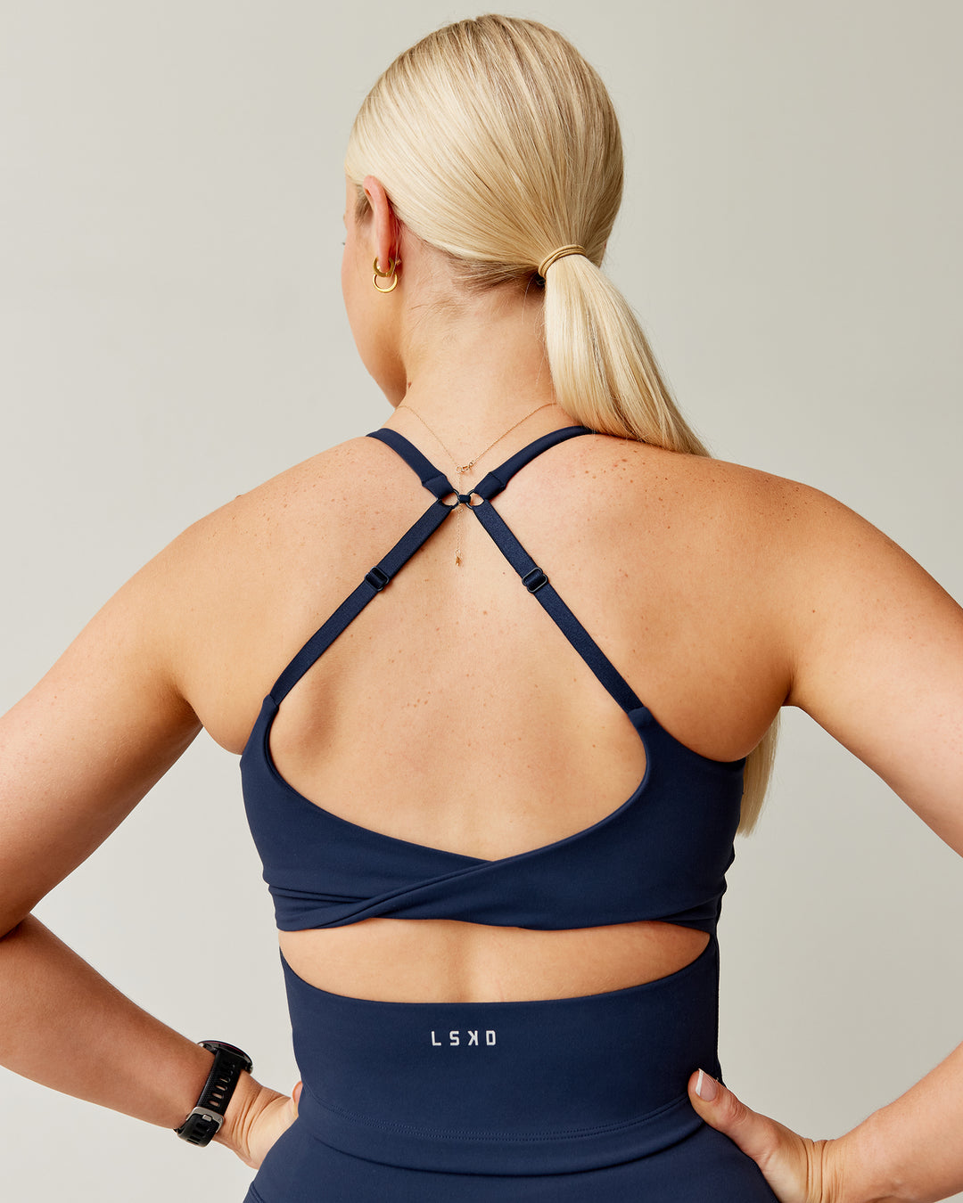 Woman wearing Twist Shelf Bra Tank - Future Navy - view 2