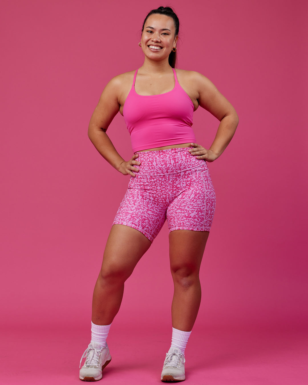 Woman wearing Twist Shelf Bra Tank - Ultra Pink - view 2