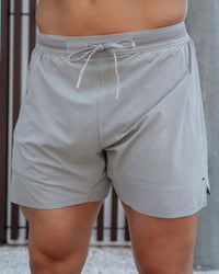 Man wearing UltraAir 5" Lined Performance Shorts - Circular Grey | Thumbnail Index: 3