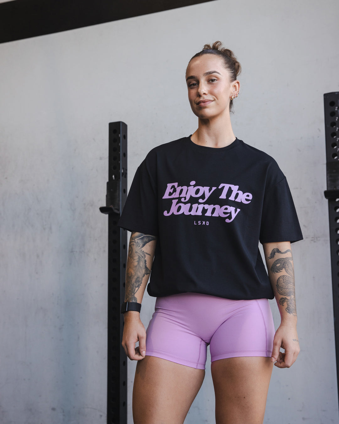 Woman wearing Unisex Enjoy The Journey FLXCotton Tee Oversize - Black-Light Violet - view 2
