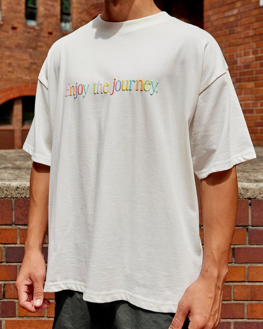Man wearing Unisex Enjoy The Journey Heavyweight Tee Oversize - Off White-Multi - view 1