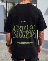 Man wearing Unisex Leg It FLXCotton Tee Oversize - Black-Volt | Thumbnail Index: 3