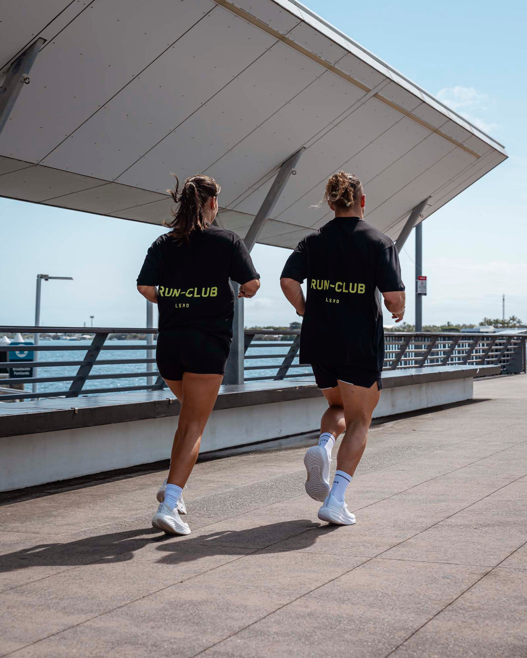 Duo wearing Unisex RUN CLUB FLXCotton Tee Oversize - Black-Volt - view 4