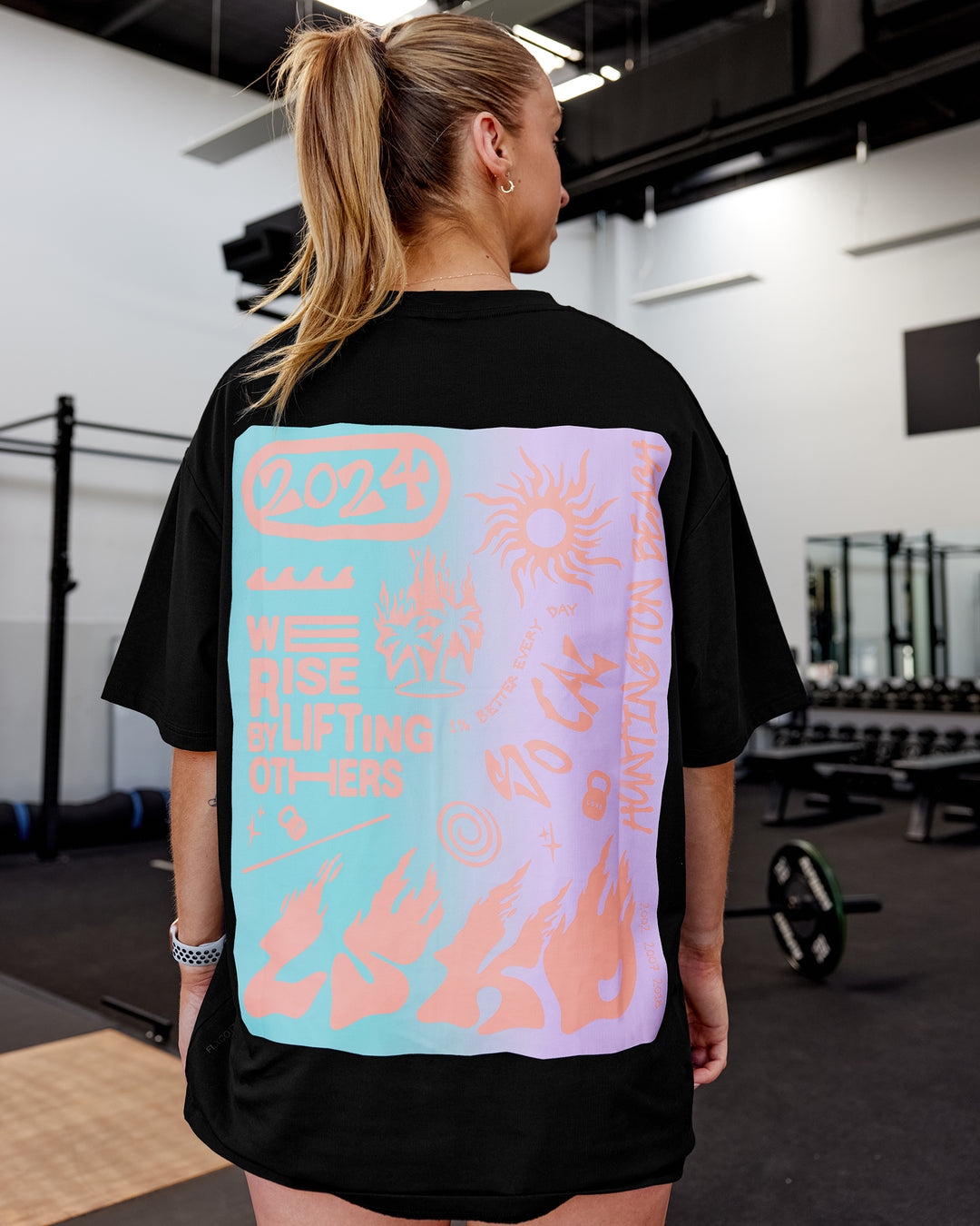 Woman wearing Unisex So Cal 24 FLXCotton Tee Oversize - Black-Beacon Orange - view 2