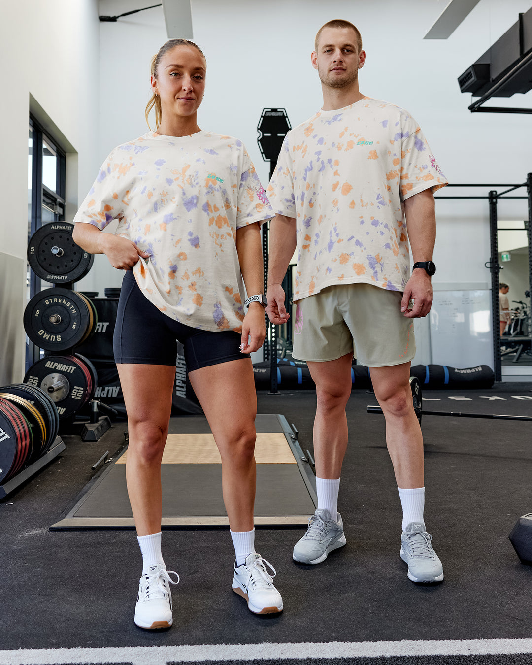Duo wearing Unisex Washed Huntington 24 Heavyweight Tee Oversize - Tie Dye Tangerine-Dahlia Purple - view 6