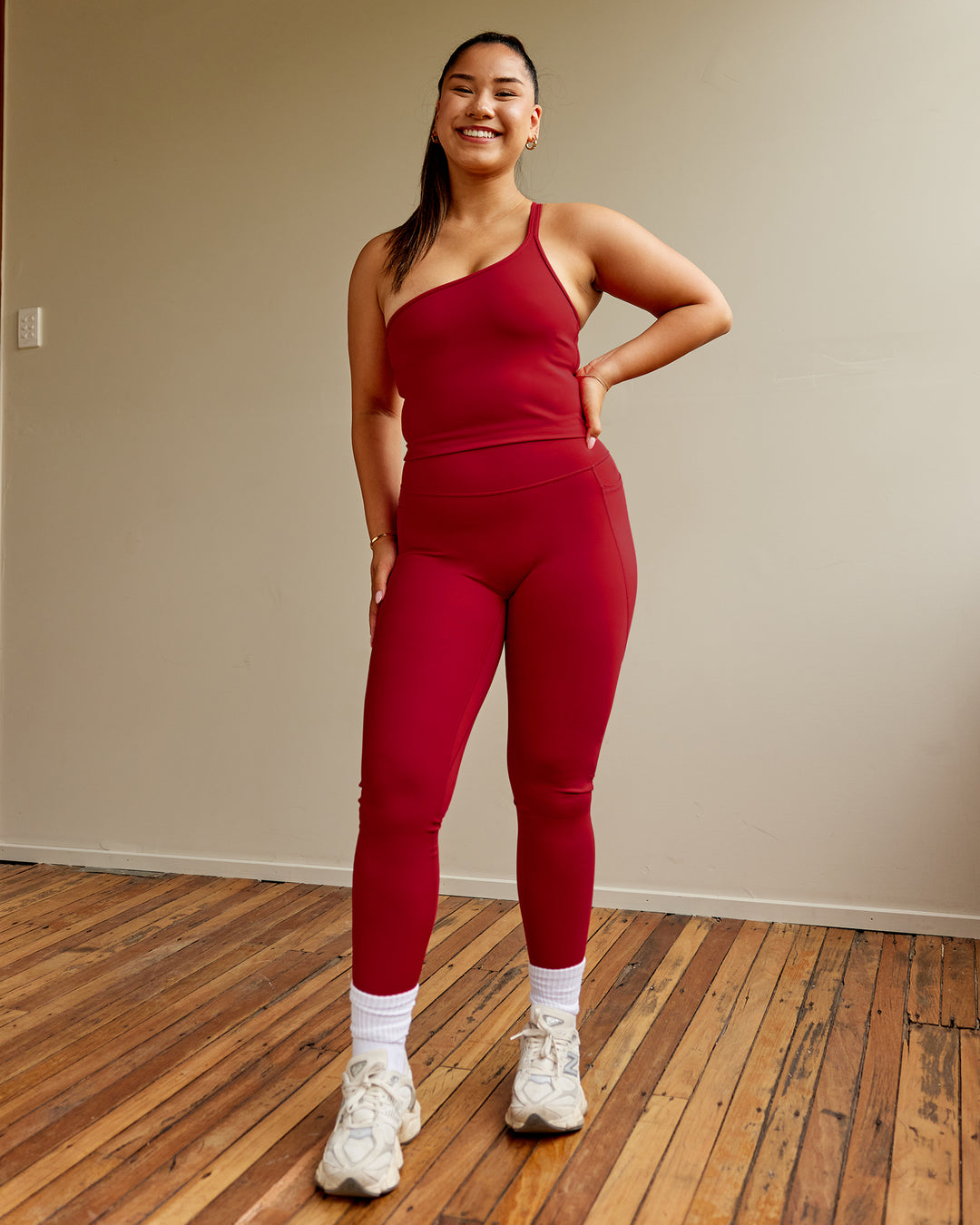 Woman wearing Vivid Skimmer Shelf Bra Tank - Cherry Red - view 2