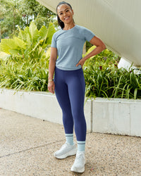 Woman wearing AeroFLX+ Seamless Tee - Elemental Blue/Ice Blue | Thumbnail Index: 3