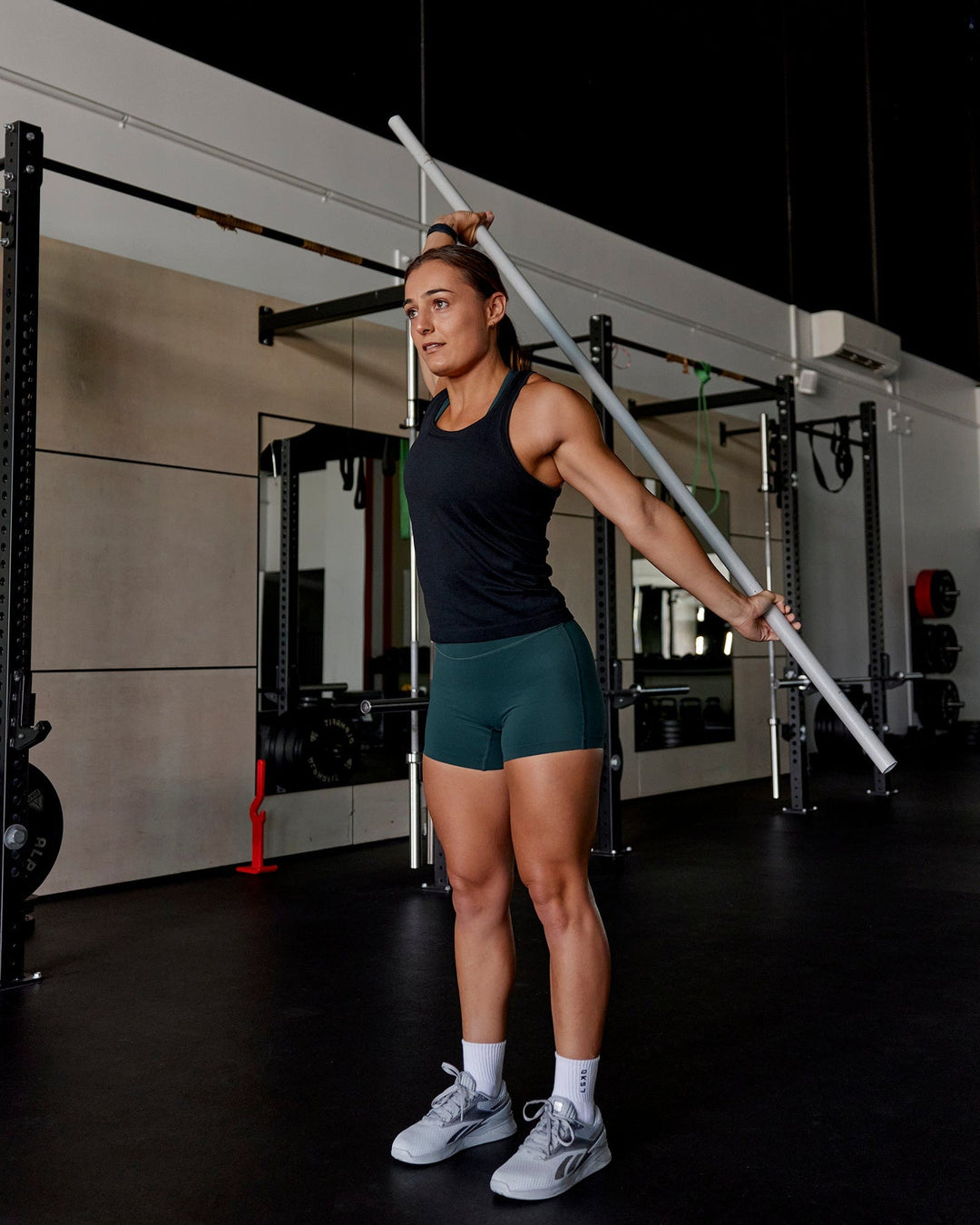 Woman wearing AeroFLX+ Seamless Tank - Black Marl - view 5