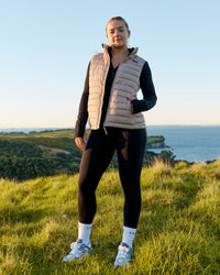 Woman wearing All Day Puffer Vest - Desert | Thumbnail Index: 0