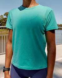 Woman wearing Love The Run FLXCotton Tee - Aquatic Awe-White | Thumbnail Index: 1