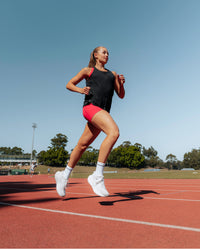 Woman wearing Pace Running Tank - Black | Thumbnail Index: 0