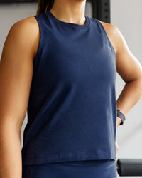 Woman wearing Deluxe PimaFLX Tank - Future Navy | Thumbnail Index: 0