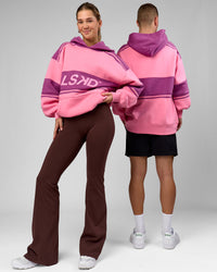 Duo wearing A-Team Oversized Hoodie - Candy Pink-Boysenberry | Model:Amity | Size:S | Model:Arran | Size:M | Thumbnail Index: 1