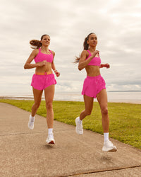 Woman wearing Accelerate 3" Running Short - Ultra Pink | Model:Duo | Size:Both | Thumbnail Index: 6