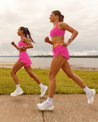 Woman wearing Accelerate 3" Running Short - Ultra Pink | Model:Duo | Size:Both | Thumbnail Index: 7