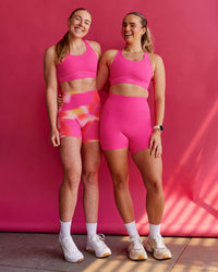 Woman wearing Fusion Sports Bra 2.0 - Ultra Pink | Thumbnail Index: 2