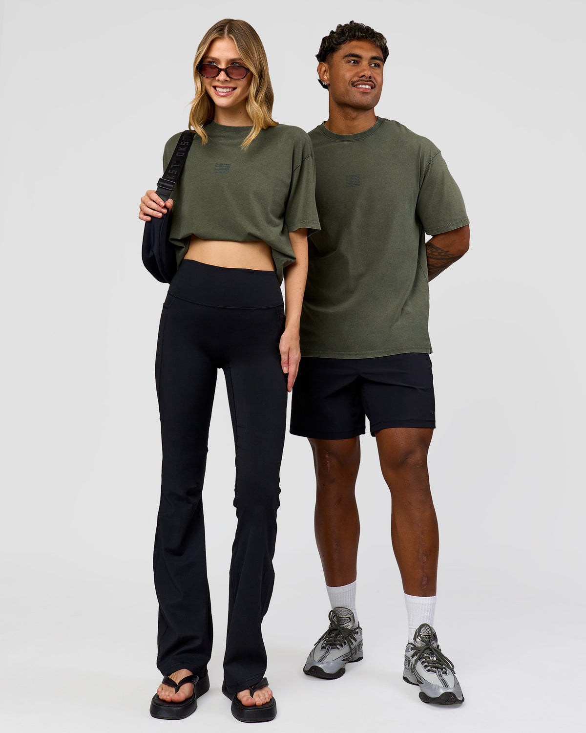 Duo wearing Everyday Elevation FLXCotton Oversized Tee - Carbon Green Washed -White | Model:Leilani | Size:XS | Model:Xav | Size:L