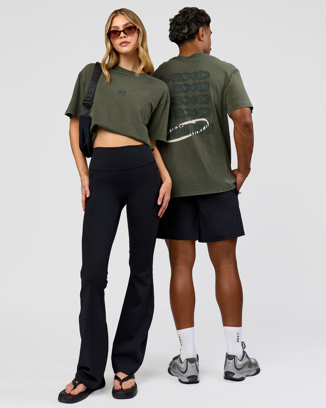 Duo wearing Everyday Elevation FLXCotton Oversized Tee - Carbon Green Washed -White | Model:Leilani | Size:XS | Model:Xav | Size:L - view 1