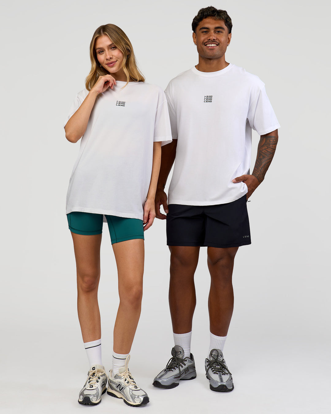 Duo wearing Everyday Elevation FLXCotton Oversized Tee - White-Carbon Green | Model:Leilani | Size:XS | Model:Xav | Size:L - view 3