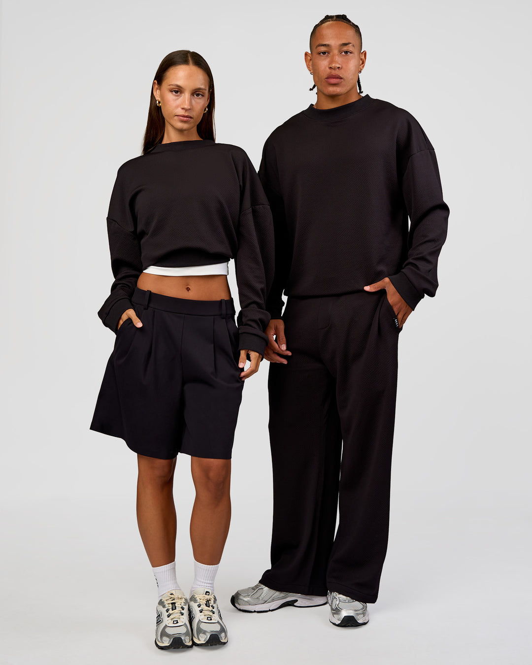 Duo wearing Everyday Elevation Waffle Oversized Sweater - Black | Model:Brylee | Size:XS | Model:Malebo | Size:M - view 1