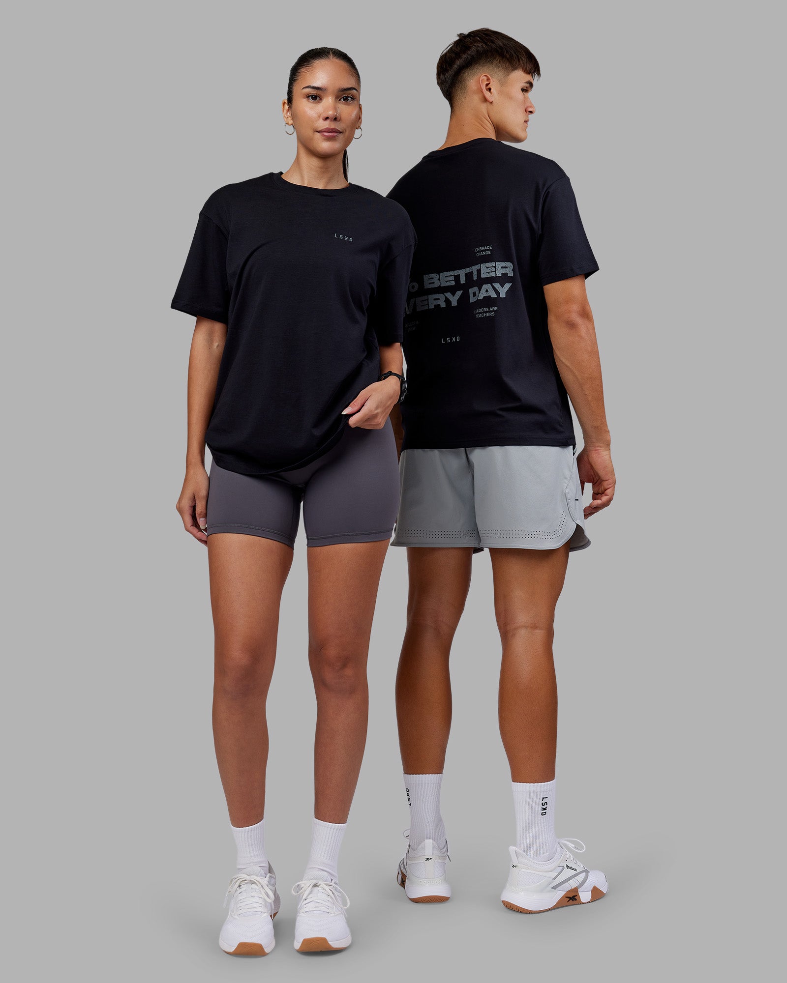 Duo wearing 1% Better Value Series FLXCotton Tee Oversize - Black-Black | Model:Both | Size:Duo