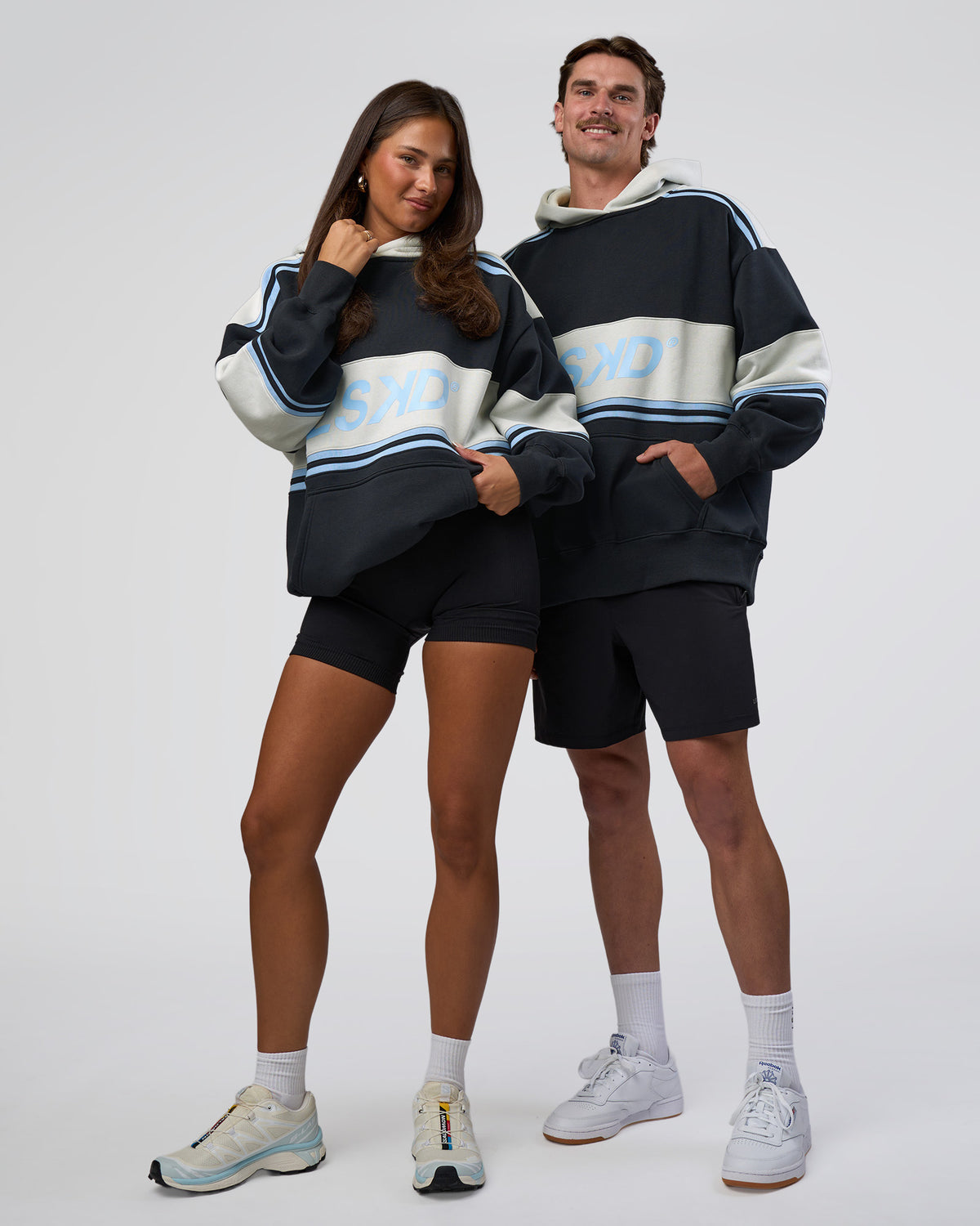 Duo wearing A-Team Oversized Hoodie - Caviar-Open Air | Model:Both | Size:Duo