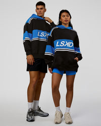 Duo wearing A-Team Oversized Hoodie - Caviar-Palace Blue | Model:Jackson | Size:L | Model:Loren | Size:XS | Thumbnail Index: 0