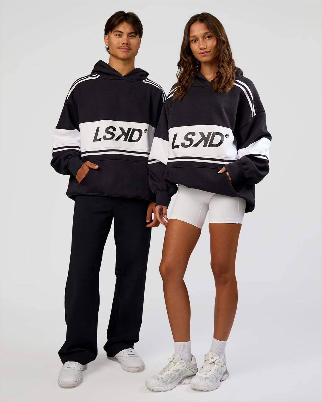 Duo wearing A-Team Oversized Hoodie - Caviar-White | Model:Both | Size:Duo - view 1