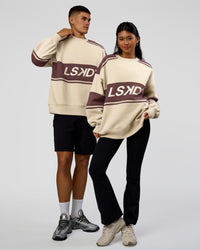 Duo wearing A-Team Sweater Oversize - Shale Beige-Cocoa Powder | Model:Jackson | Size:L | Model:Loren | Size:XS | Thumbnail Index: 0