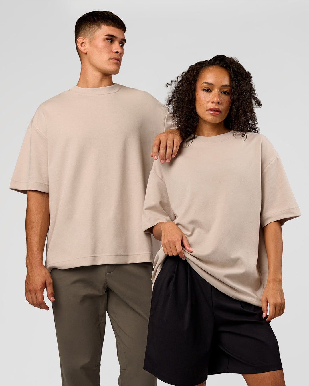 Duo wearing AfterDark ZeroCrease Oversized Tee - Shale Beige | Model:Both | Size:Duo - view 1