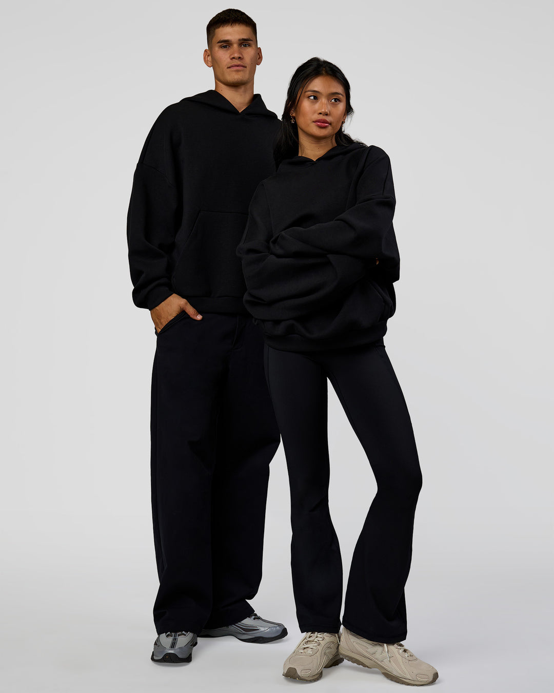 Duo wearing AfterDark ZeroCrease Oversized Hoodie - Black | Model:Both | Size:Duo - view 1