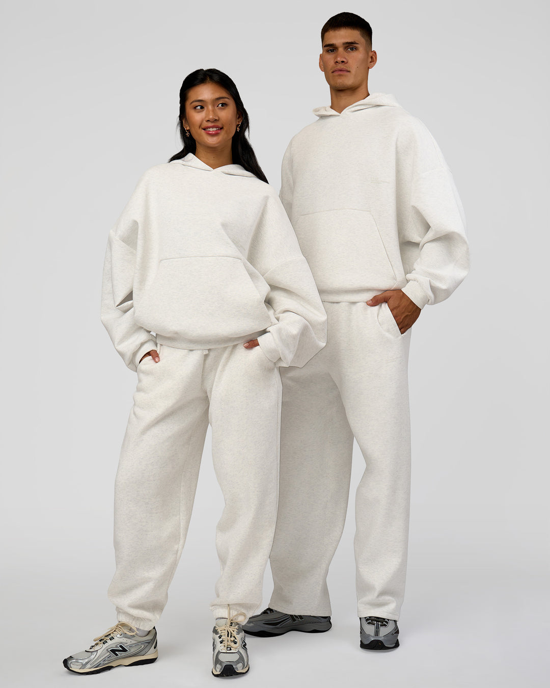 Duo wearing AfterDark ZeroCrease Oversized Hoodie - Silver Marl | Model:Both | Size:Duo - view 1