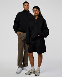 Duo wearing AfterDark ZeroCrease Quarter Zip - Black | Model:Both | Size:Duo | Thumbnail Index: 0