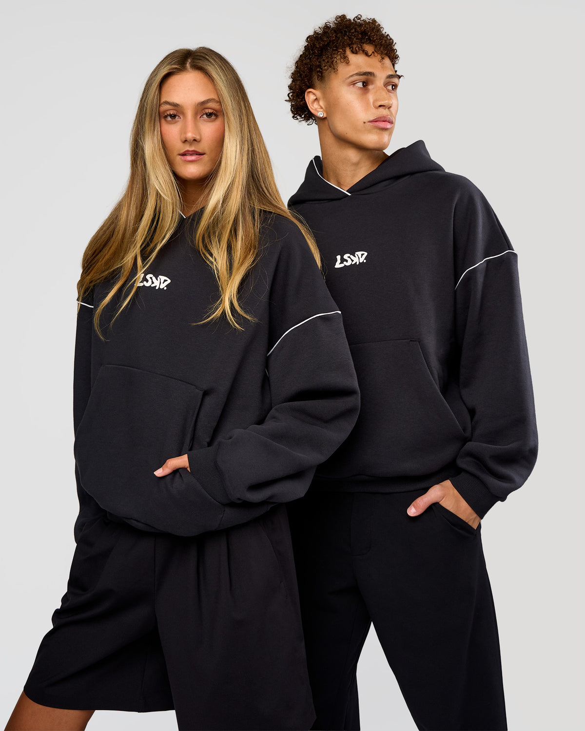 Duo wearing Axis Oversized Hoodie - Caviar-White | Model:Both | Size:Duo