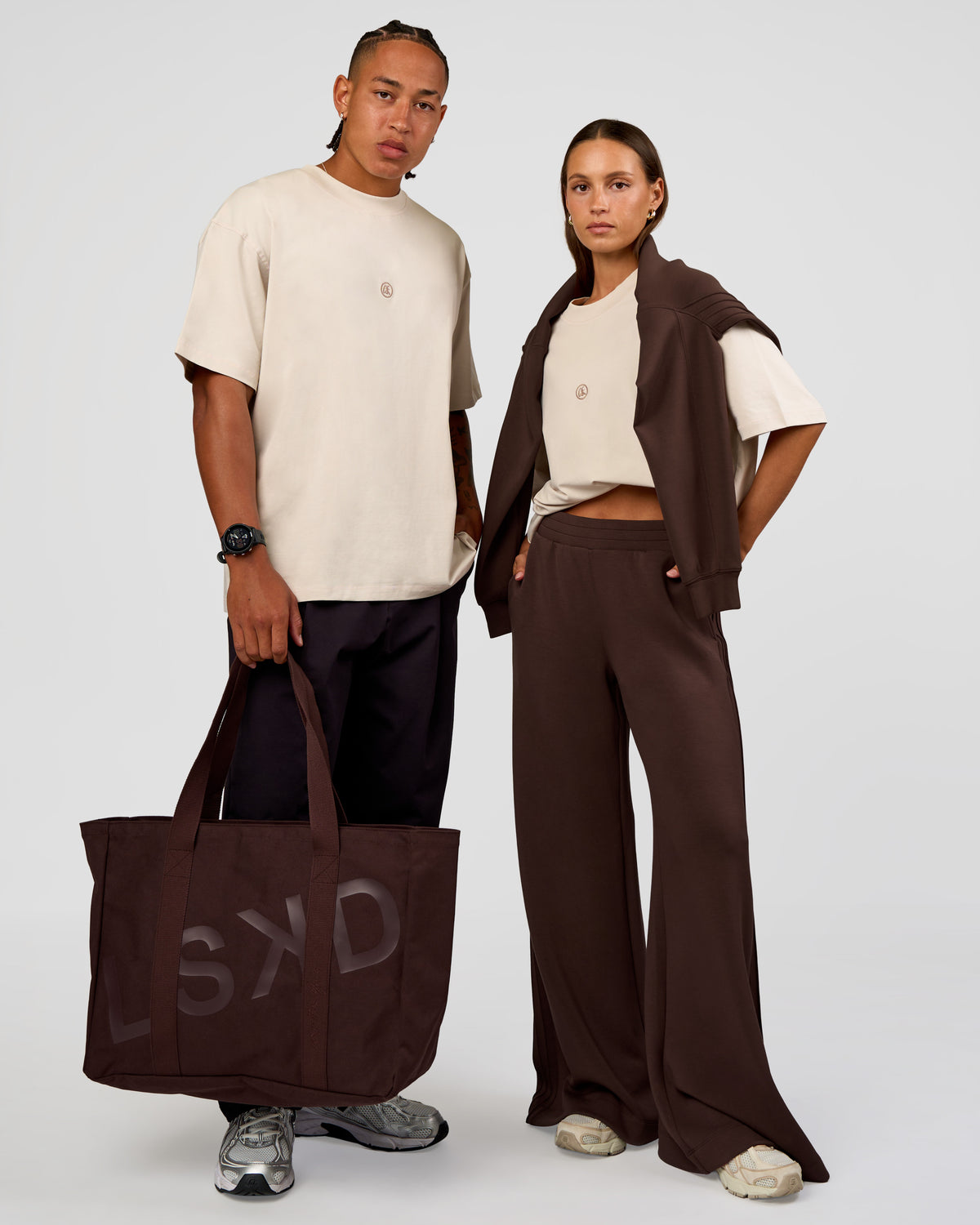 Duo wearing CF Unisex Oversized Heavyweight FLXCotton Tee - Clay-CF X LSKD Sport | Model:Malebo | Size:M | Model:Brylee | Size:XS